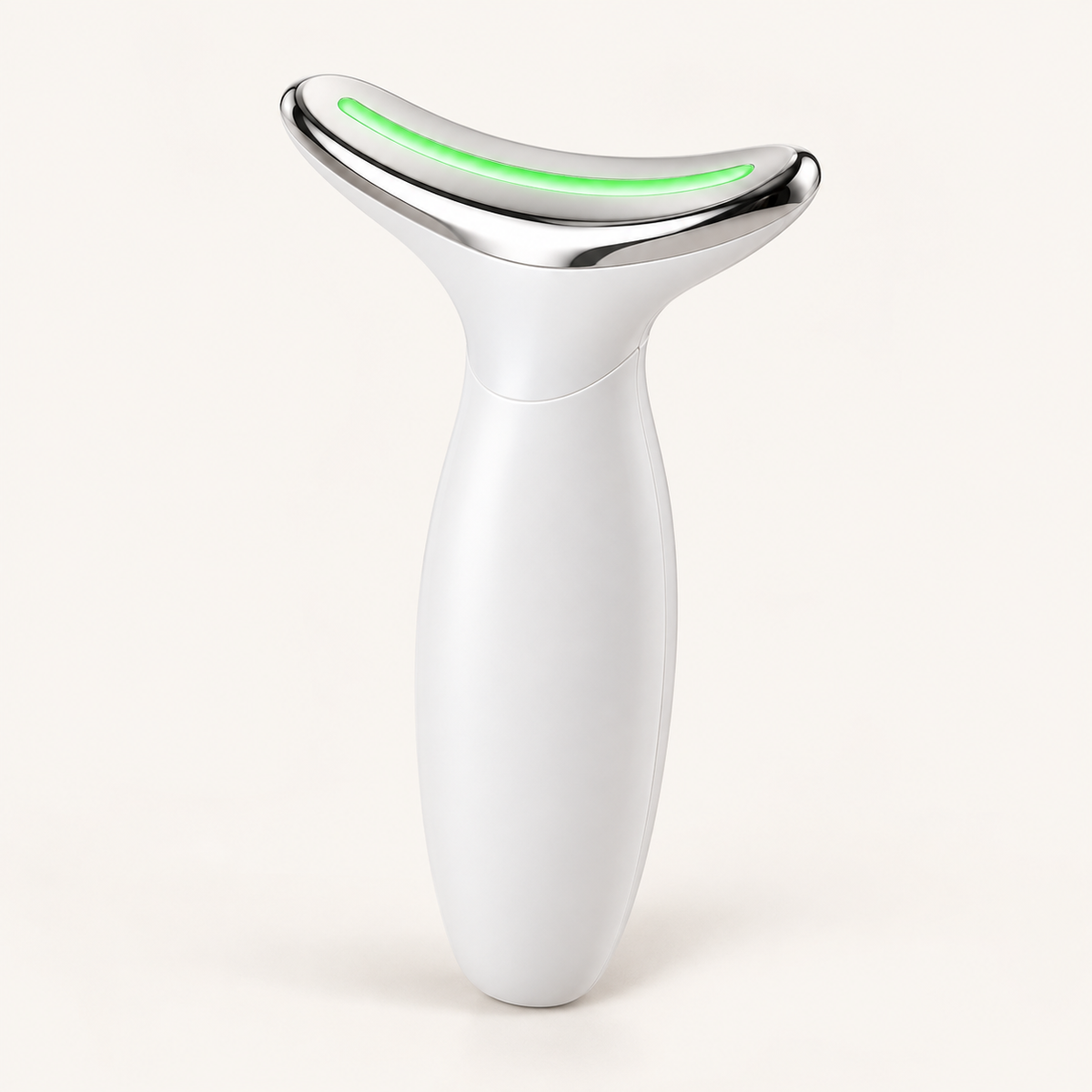 Appareil de massage visage et cou blanc avec tête chromée et lumière verte
